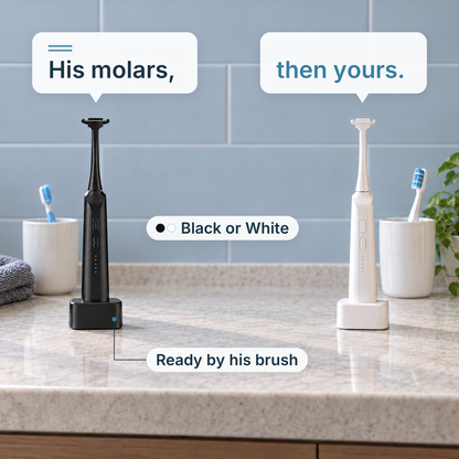 Black and white STRYN on their charging bases, one by a child's toothbrush and one by an adult's.